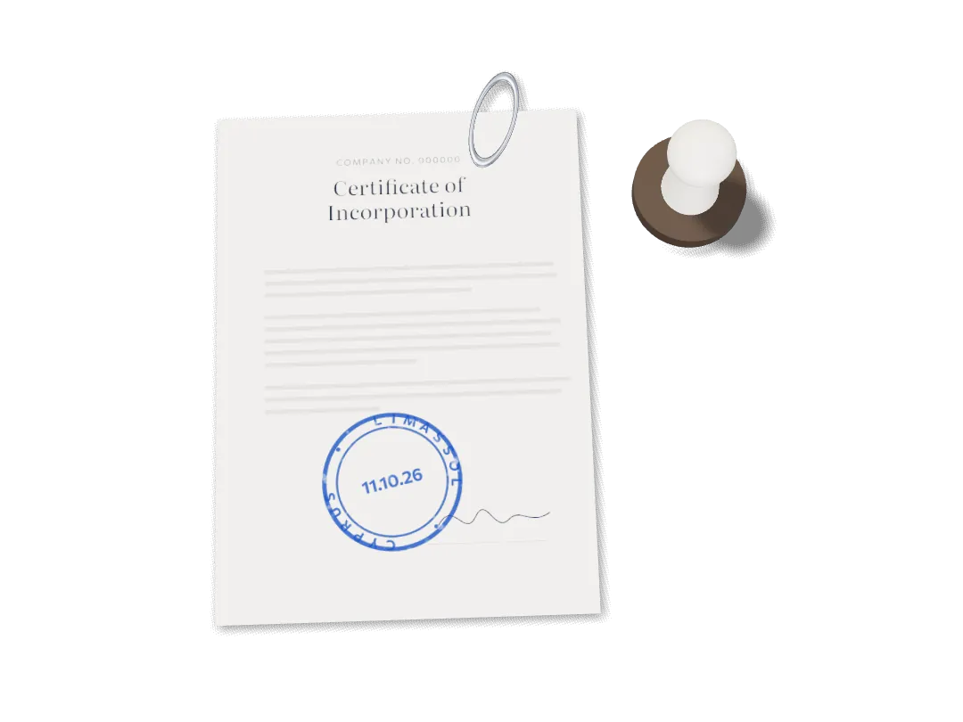 A stamped certificate, a rubber stamp and a paper clip on a desk.